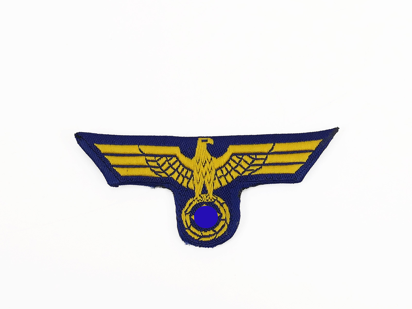 P1557384 Kriegsmarine tropical cap eagle on blue cap badge ship UV negative / folded