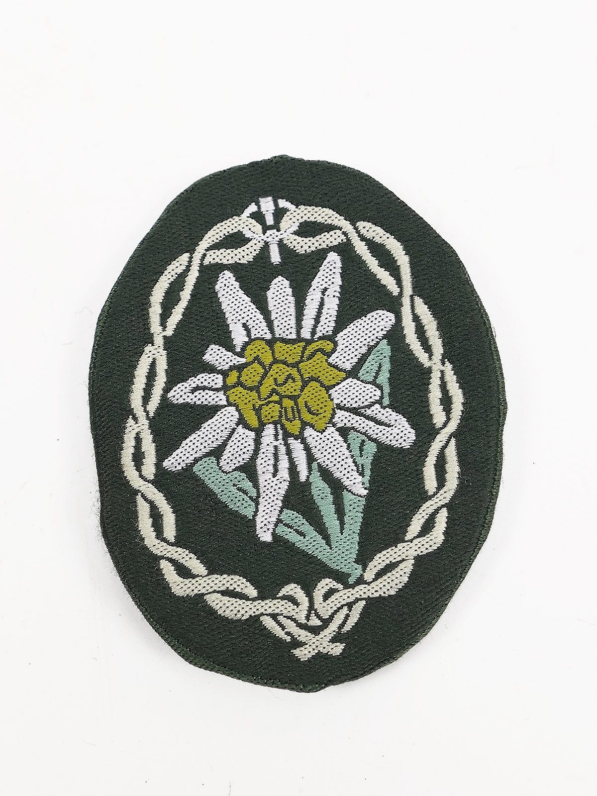 Wehrmacht fabric insignia for field jacket, Mountain Infantry, Edelweiss, woven, folded over, sleeve insignia