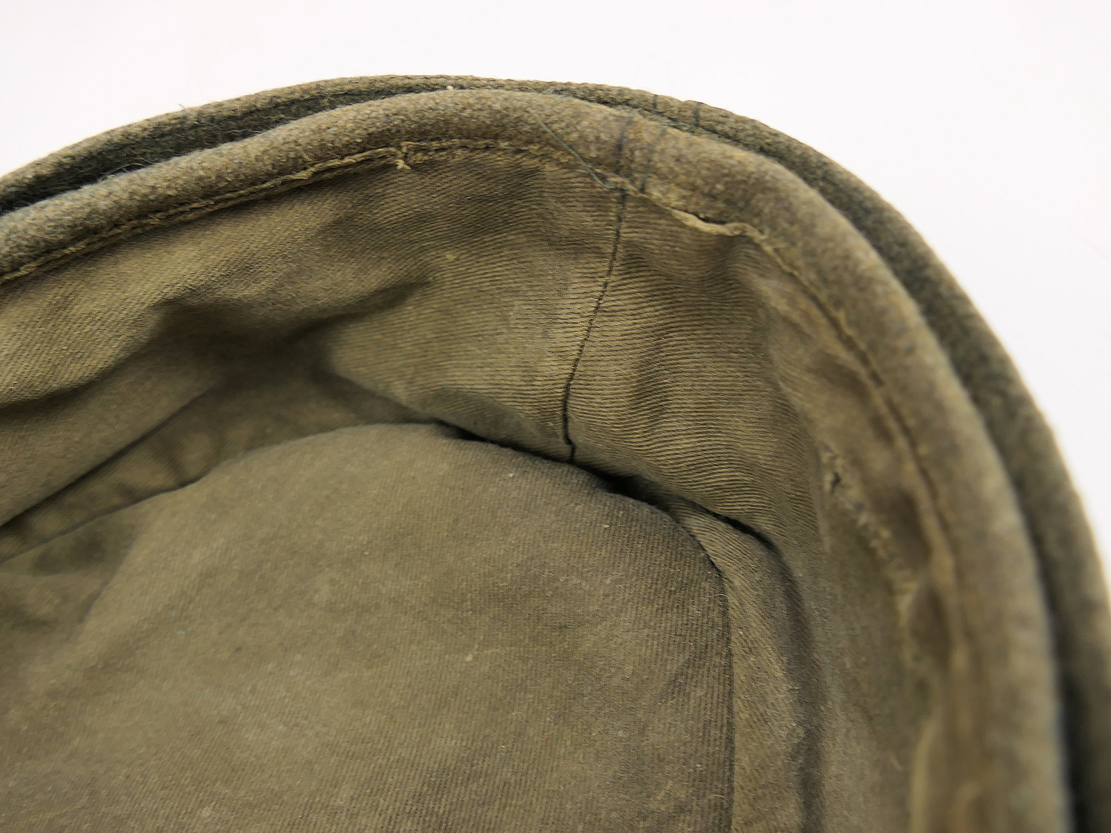 Army M43 field cap, FADE OUT, size 57, with original trapezoid detailing – COLLECTION