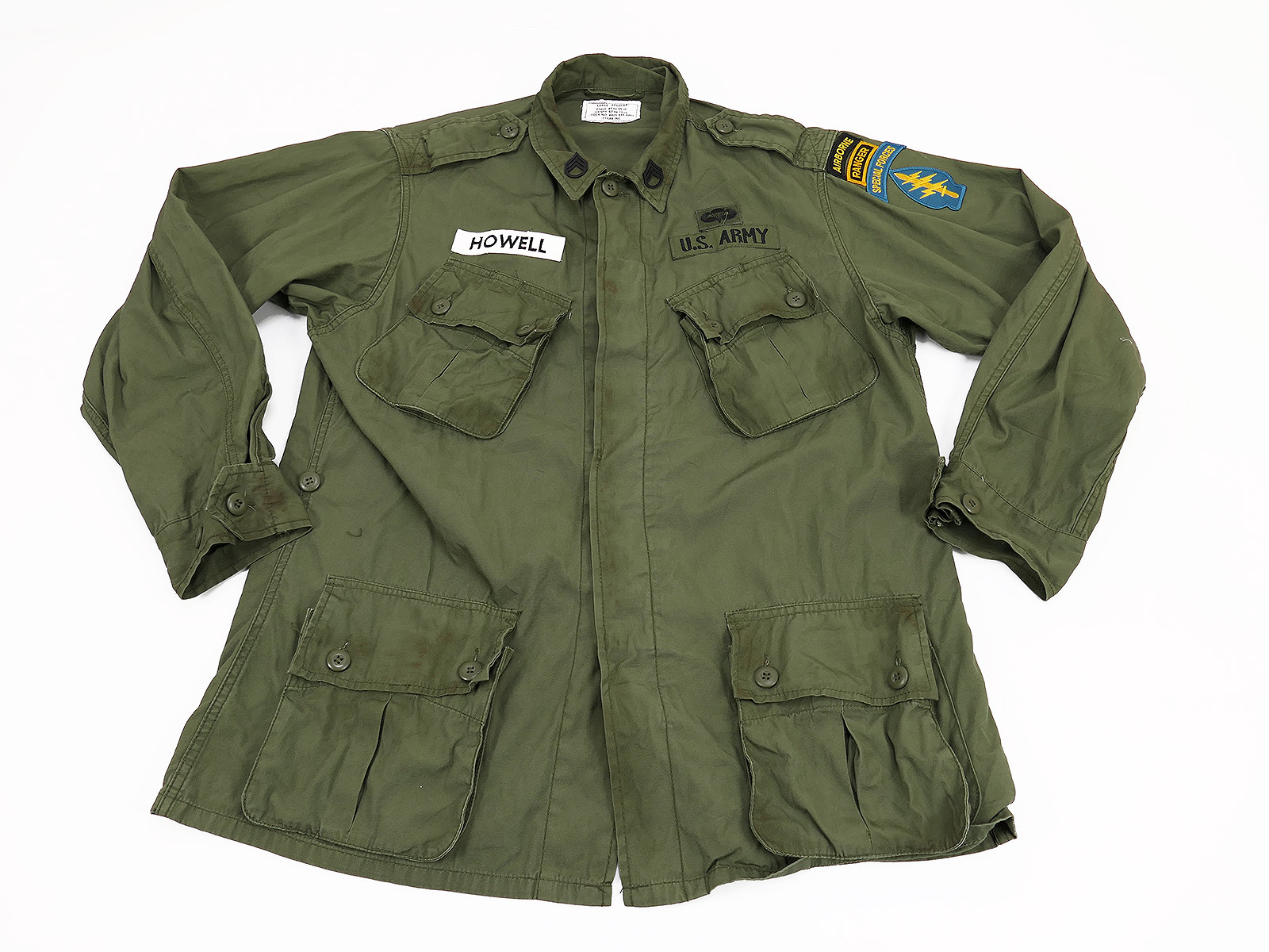 Vintage US Army M64 Jungle Jacket (film prop) with HOWELL Special Forces Vietnam patches – olive – size Large