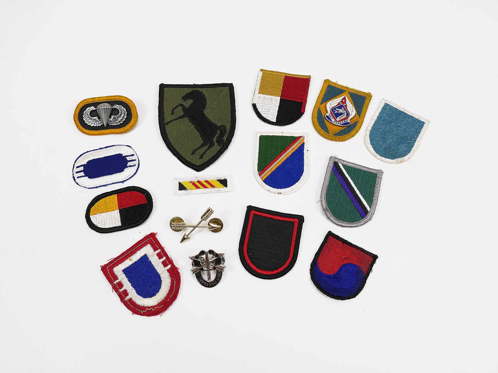 Mixed lot US Army Special Forces beret badge