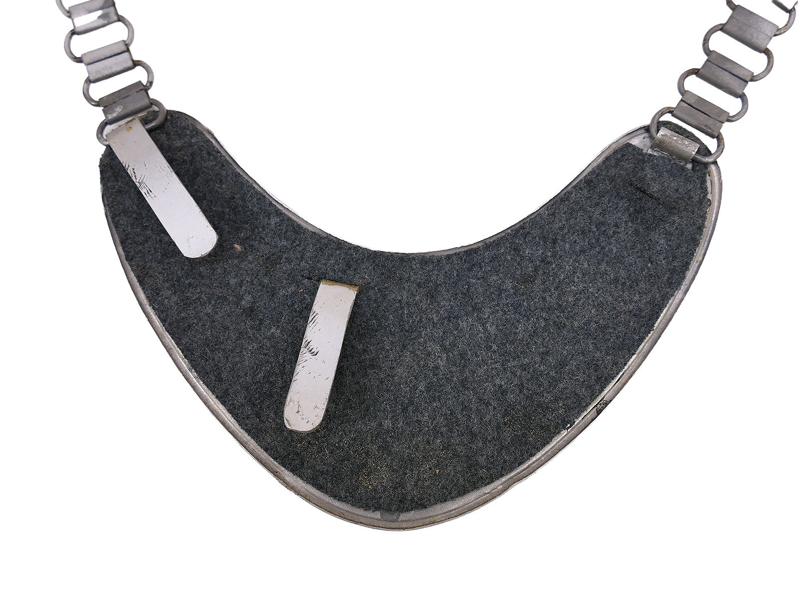 Wehrmacht ring-collar field gendarmerie collar badge (Army) with chain, from a collection being wound up