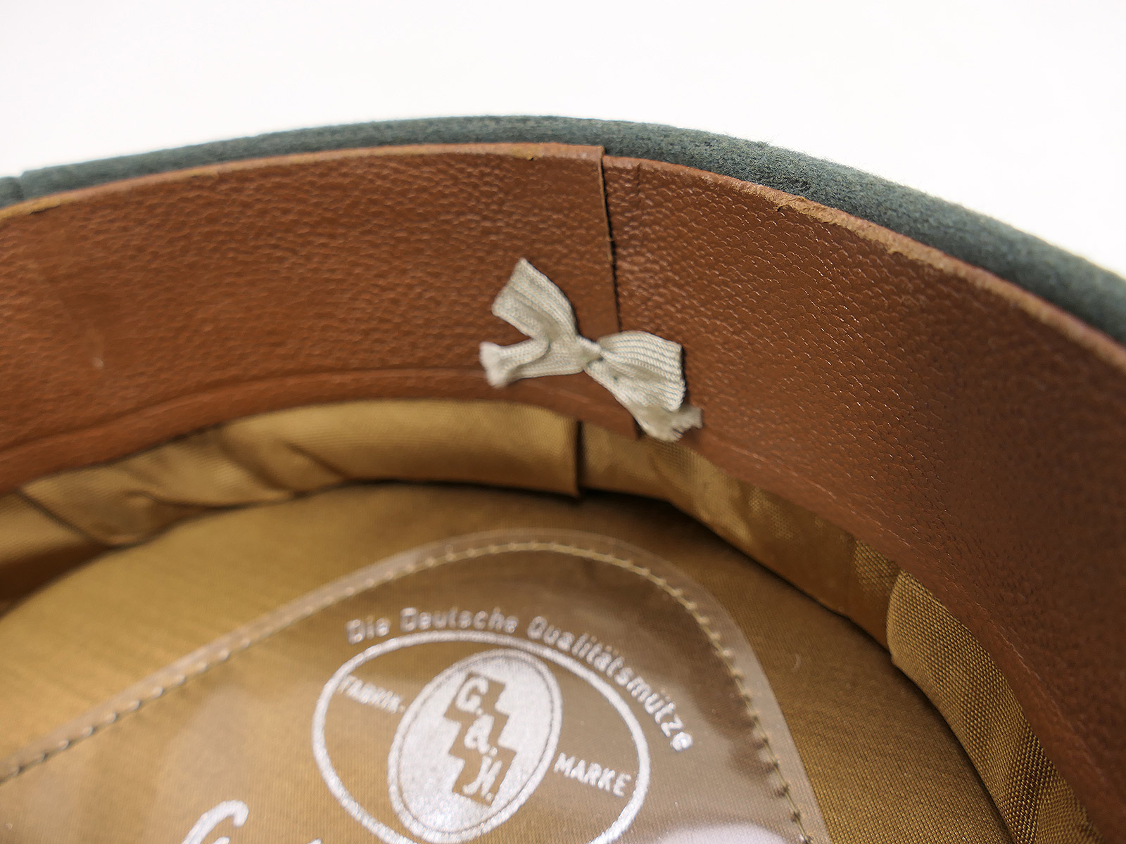 Antique Wehrmacht General’s peaked cap, size 58, with excellent patina – COLLECTION BATTLE WORN
