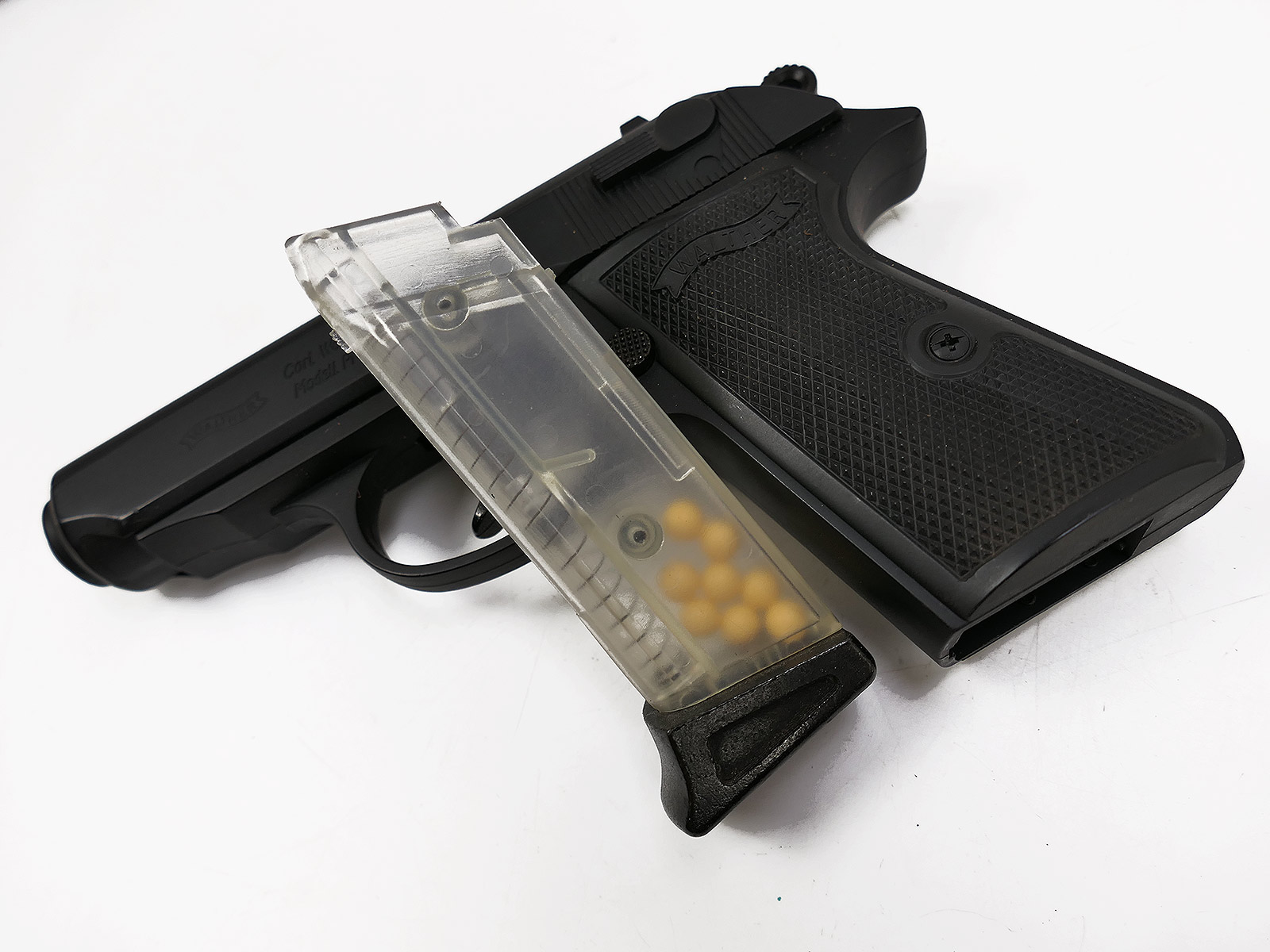 Police pistol holster for 7.65 calibre PPK short pistol with 6mm blowback pistol; holster is full but non-functional