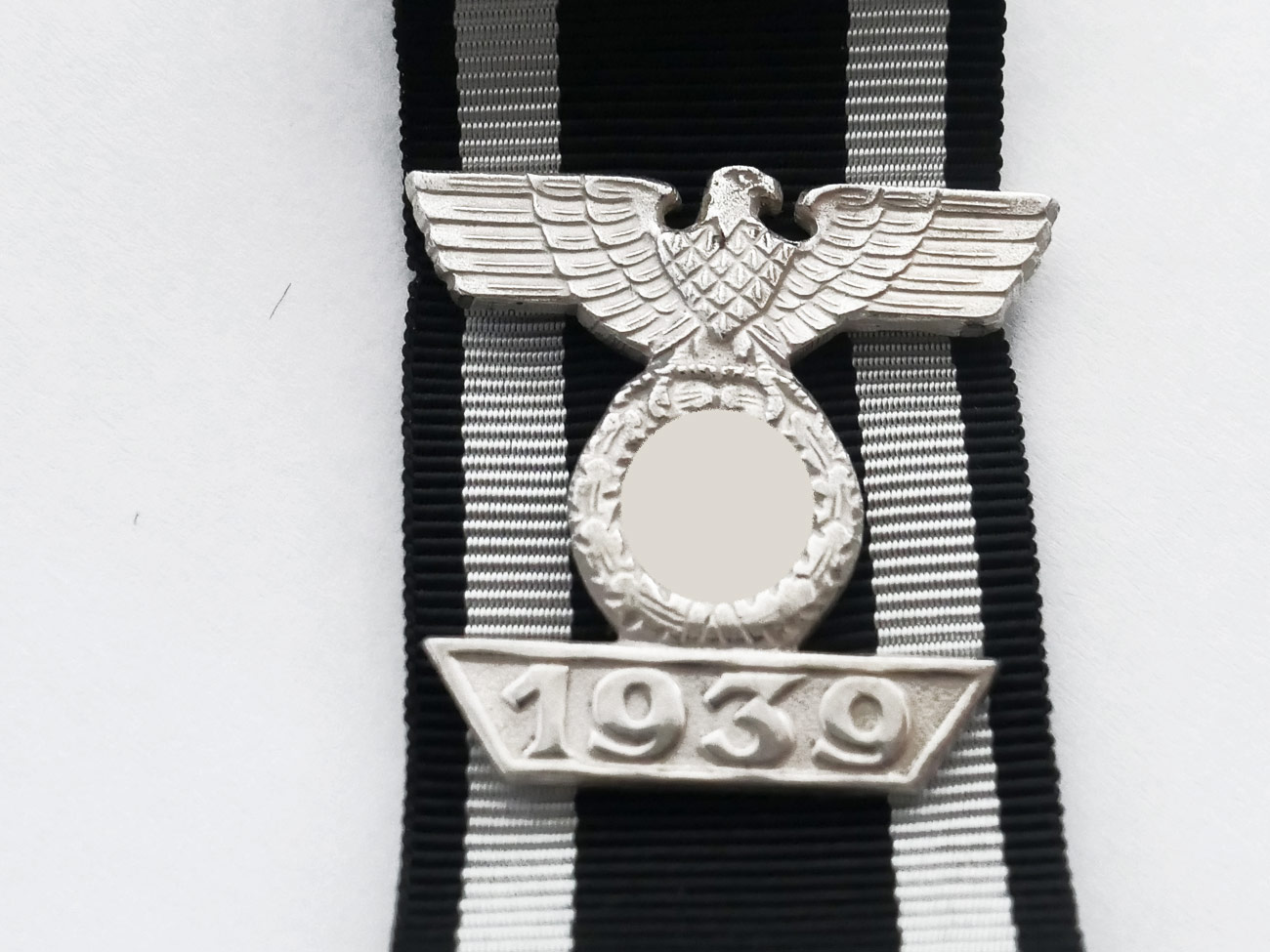 Repeat bracelet 1939 on the ribbon to the Iron Cross 1st class 1914 / EK1