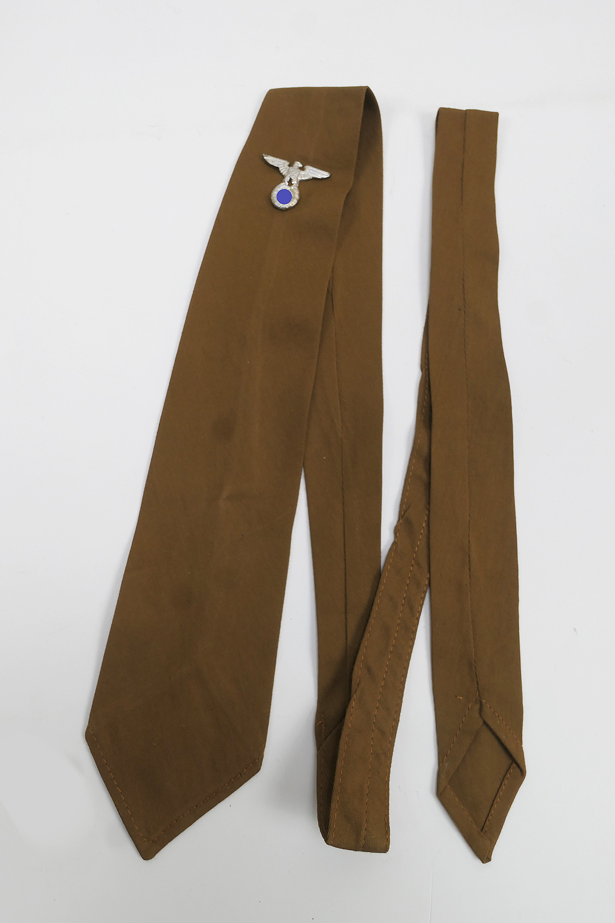 P1520608 Uniform tie brown with party badge tie