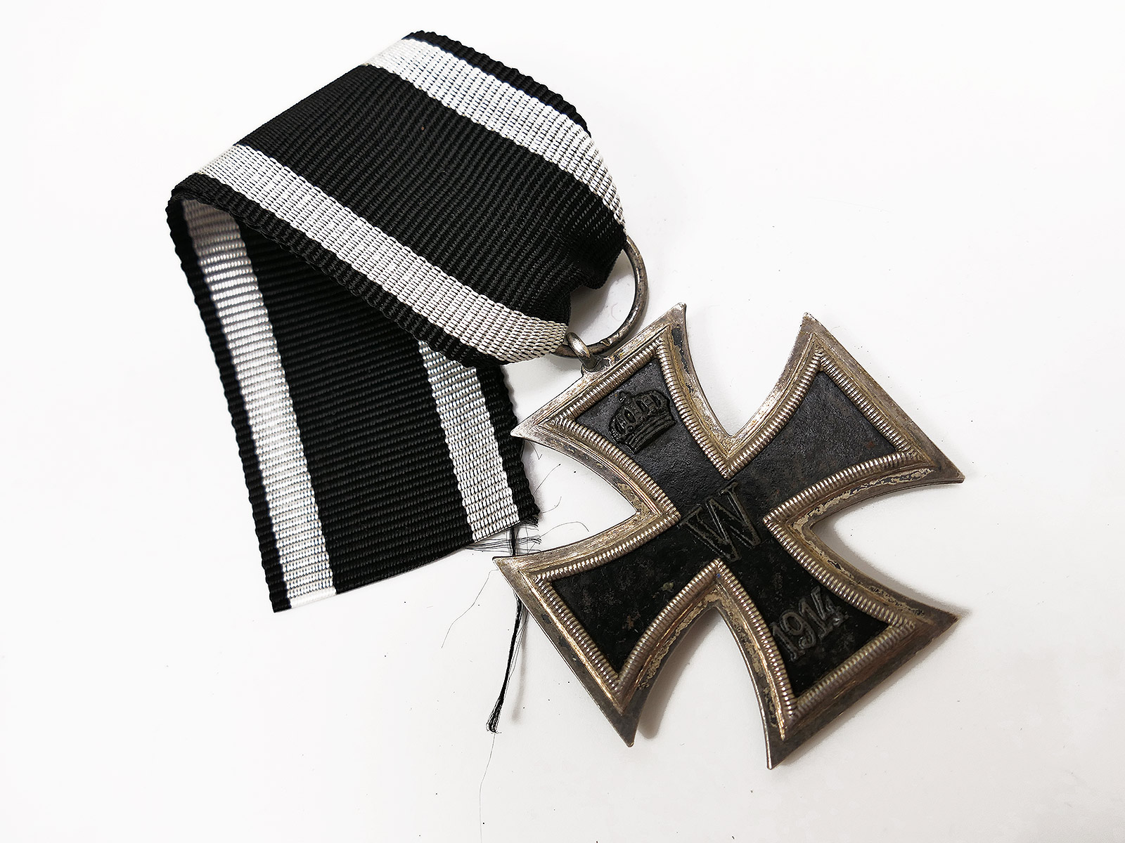 #L/ Original WWI Iron Cross 2nd Class 1914 / 1813 EK2 Manufacturer: Royal Mint, on a ribbon