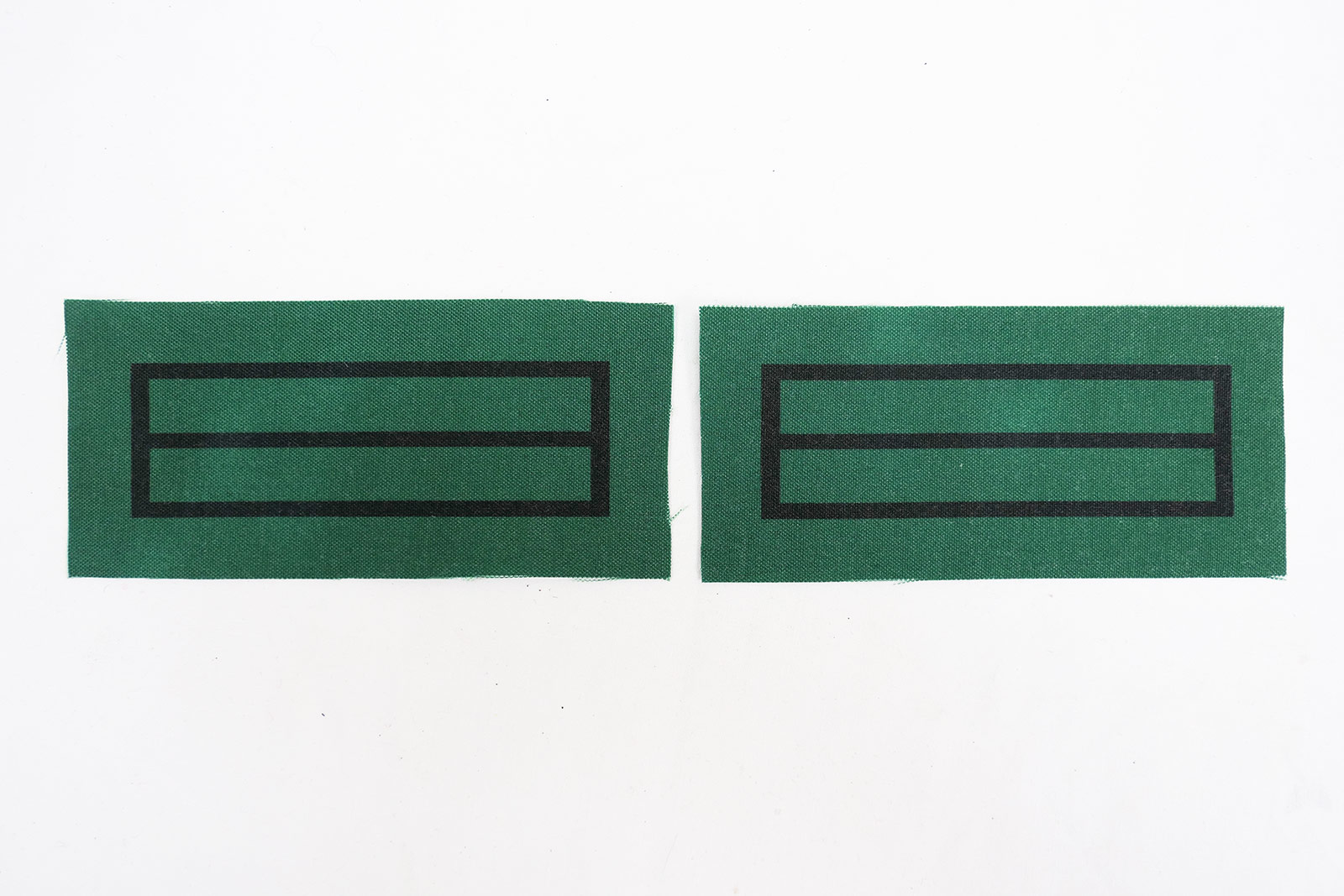 1x pair of WSS Scharführer Oberjunker rank badges for camouflage uniforms and special clothing