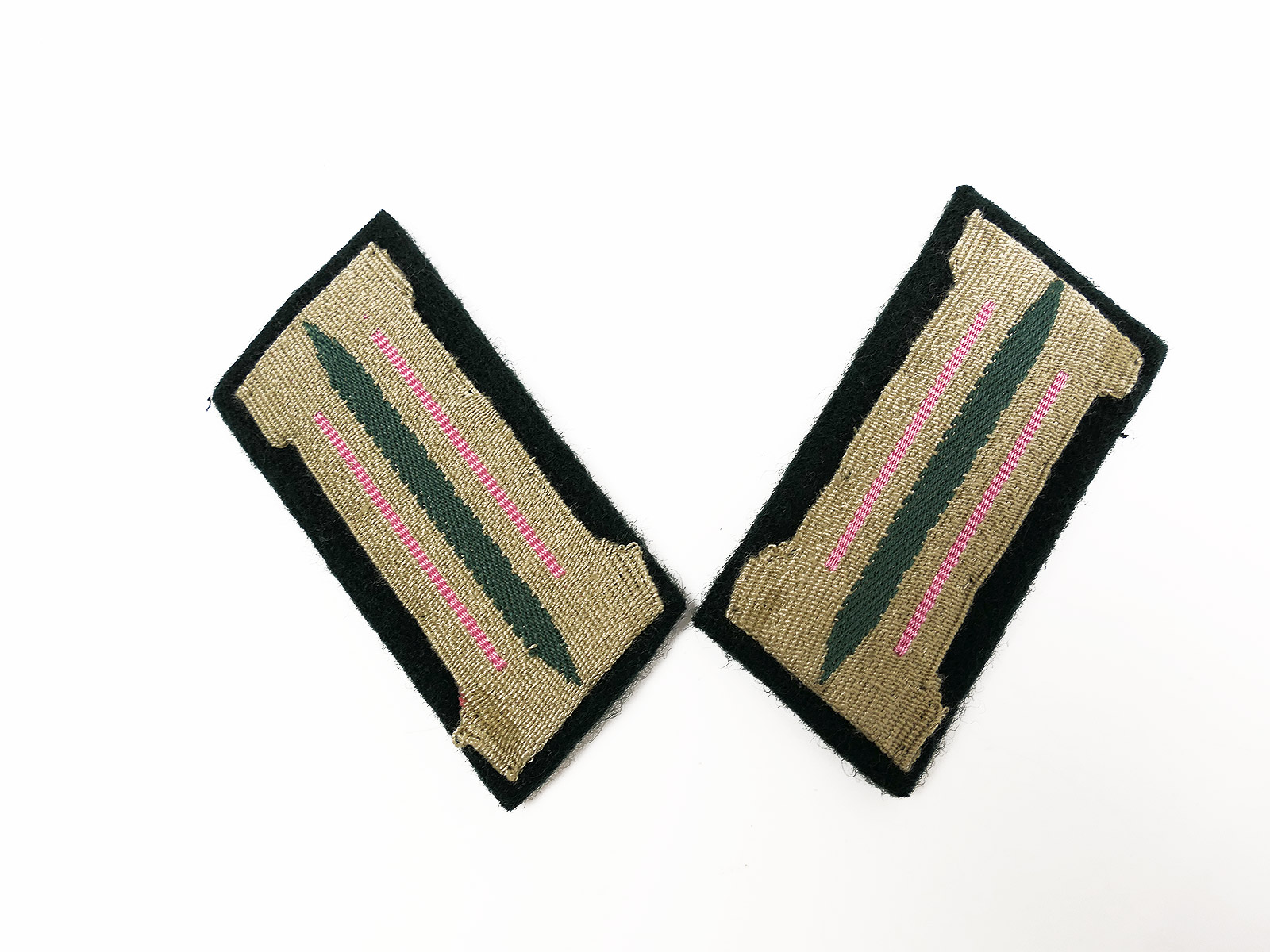 Wehrmacht pair of collar badges: Tank/Anti-tank (pink) – rank insignia on an M36 backing