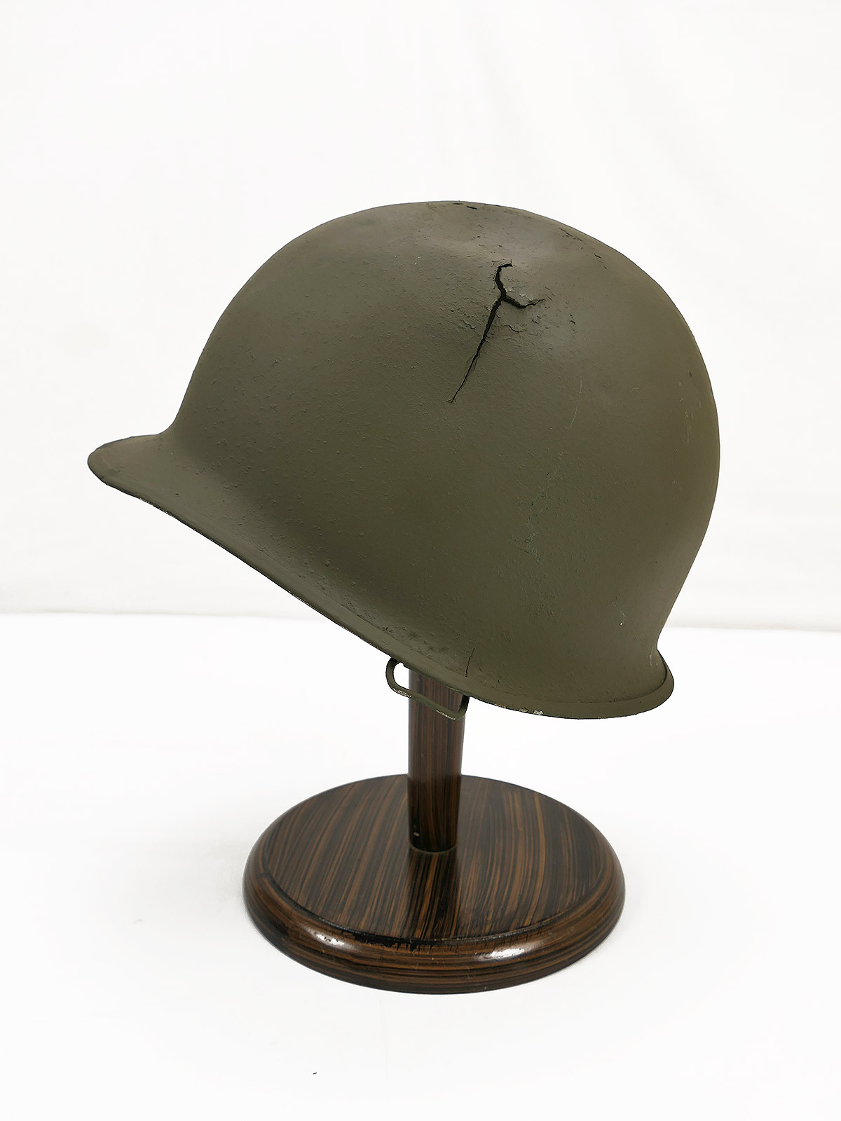 Original US M1 steel helmet shell, WW2, battle-damaged, found on the battlefield