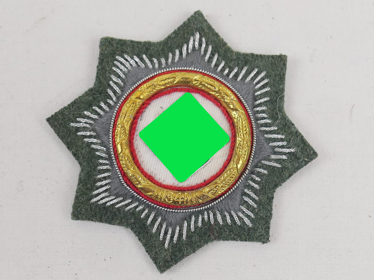 P1510892 German cross in gold fabric design on field grey background