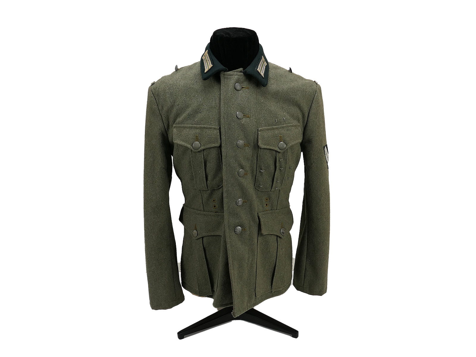 Original Wehrmacht medic field blouse M36 shortened partially effected Original Wehrmacht medic field blouse M36 shortened partially effected